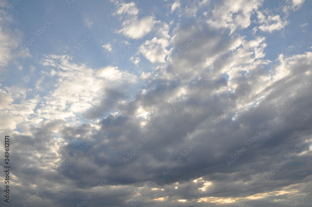 Fototapeta premium Blue cloudy sky on a summer evening.