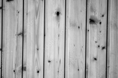 wooden wall covered with yellow lacquer. texture. the wooden texture. black and white photo