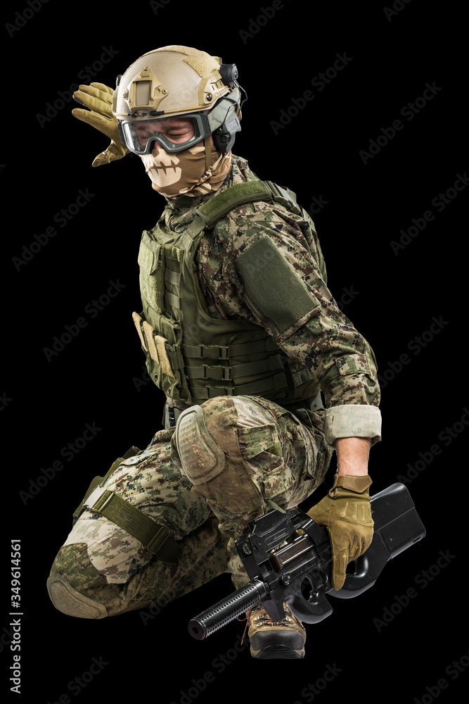US marine corps soldier with weapon. Shot in studio. isolated with clipping on black background.