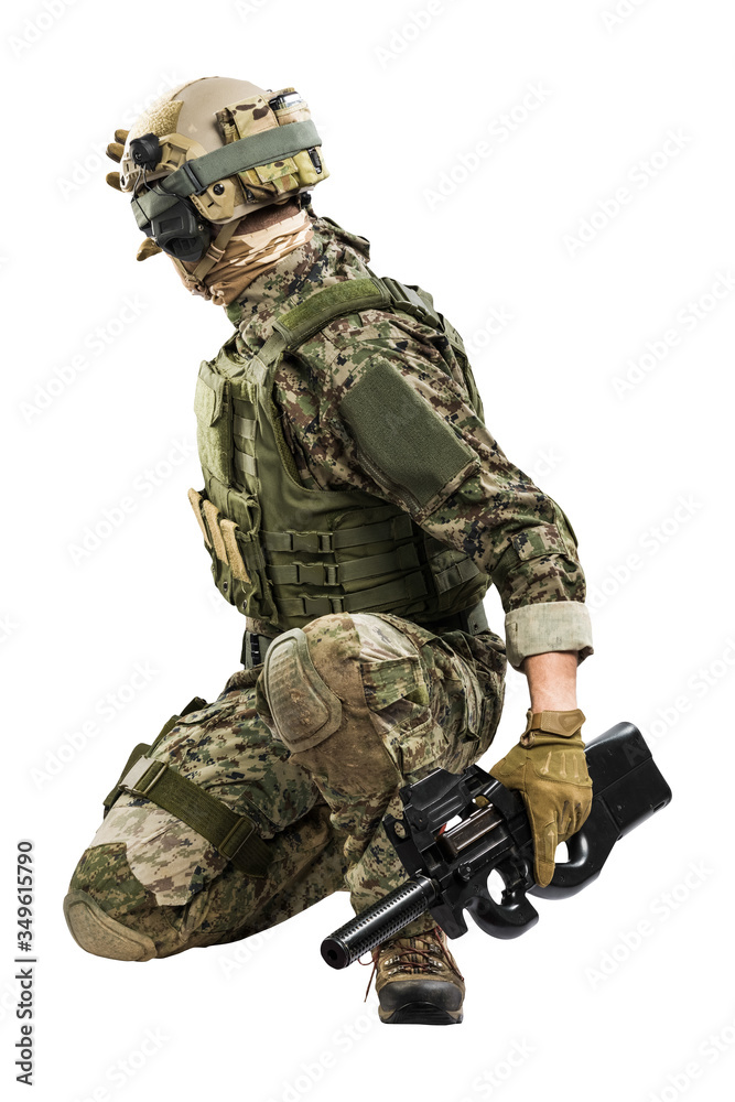 Fototapeta premium US marine corps soldier with weapon. Shot in studio. isolated with clipping on white background. 