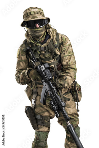 Special forces soldier with rifle. Shot in studio. Isolated with clipping path on white background. 