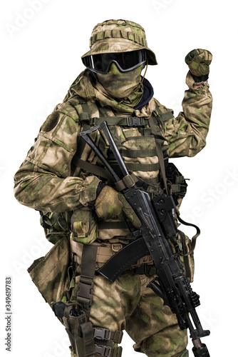 Special forces soldier with rifle. Shot in studio. Isolated with clipping path on white background.
