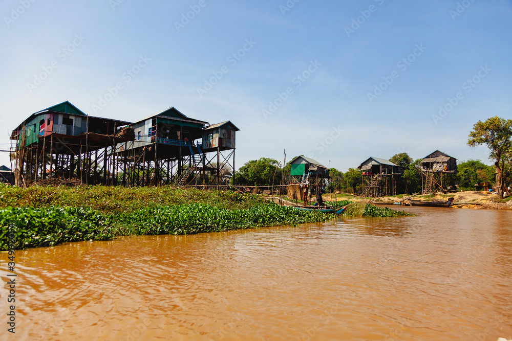 Tonle SAP, Cambodia - February 2014: Kampong Phluk village during drought season. Life and work of residents of Cambodian village on water, near Siem Reap, Cambodia