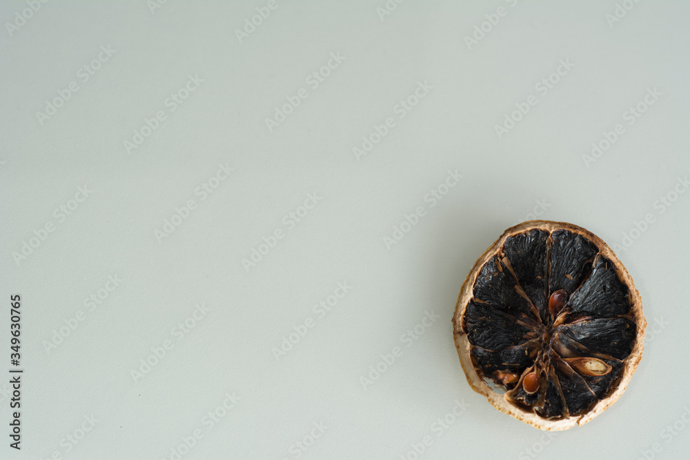Slice of dry orange on a white background Slice of dry orange on a white background