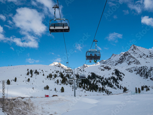 Winter Ski lift at Kühtai Tirol with blue sky background photo