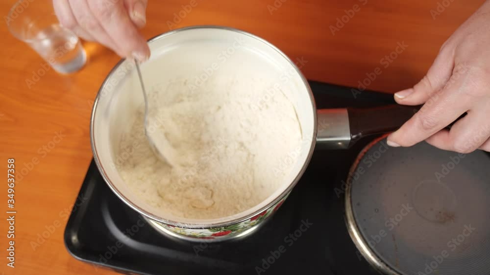 Preparation of the dough on the stove. The view from the top Preparation of the dough on the stove. The view from the top