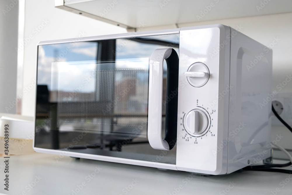 Microwave oven in fast food shop and restaurant. Close up Microwave oven in fast food shop and restaurant. Close up