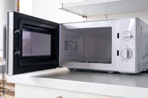 Microwave oven in fast food shop and restaurant. Close up