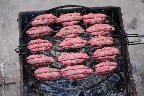 luleh kebab on the grill over hot coals, close-up photo