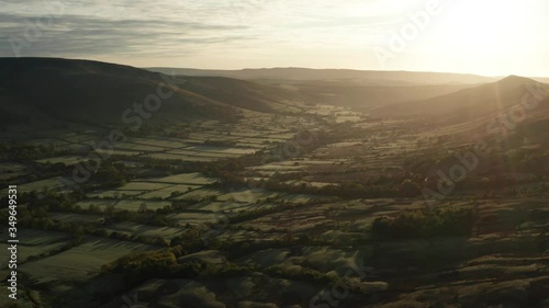 British countryside sunrise aerial over Edale Valley in the Peak District photo