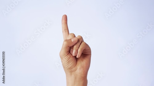 Closeup hand showing one index finger up, getting an idea gesture isolated on white background
