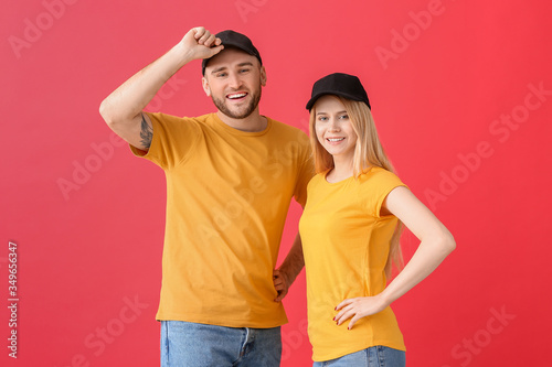 Young couple in stylish cap...