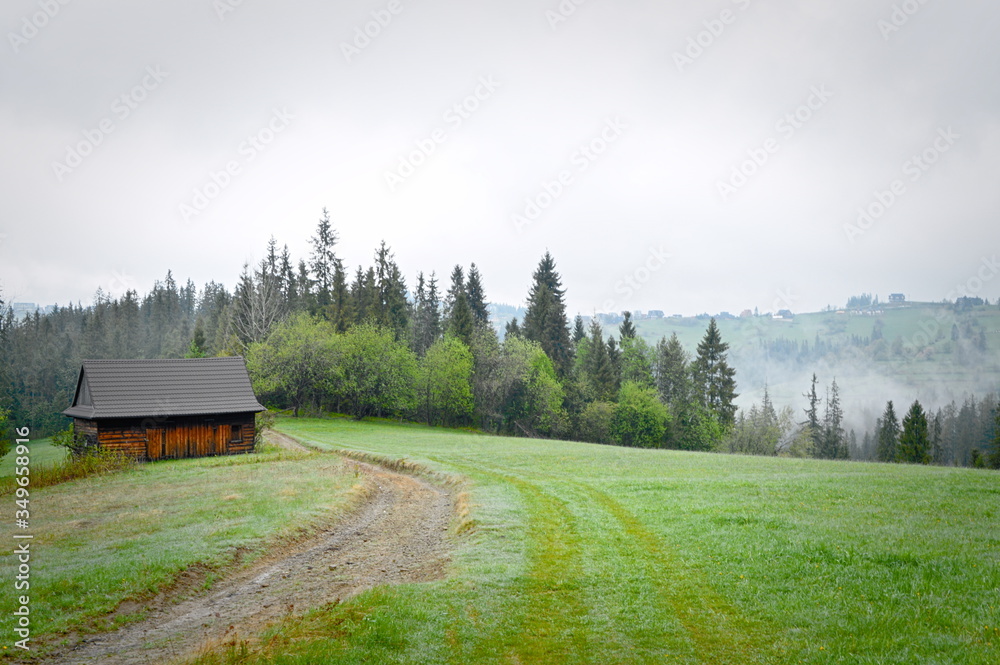 rural landscape with wooden house, mountain landscape