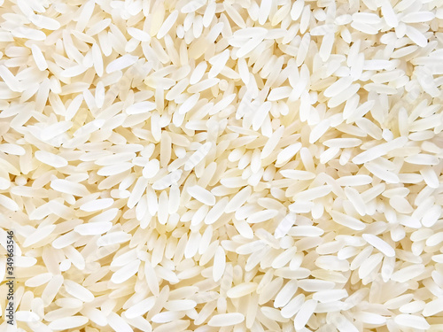 Parboiled rice texture background. Selective focus.