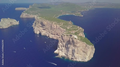 Aerial view of Capo Caccia Sardinian cliff with a lighthouse on the top 