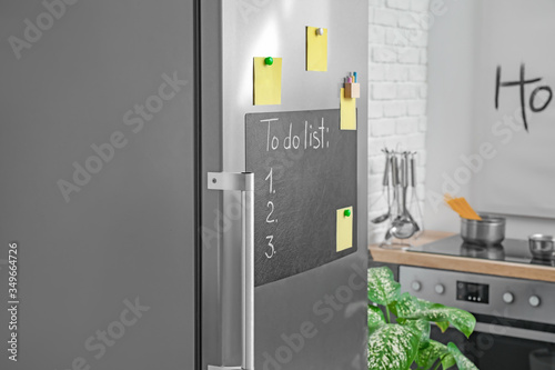 Chalkboard on door of refri...