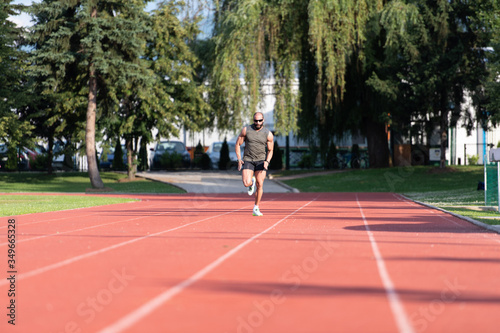 Man Running on Track