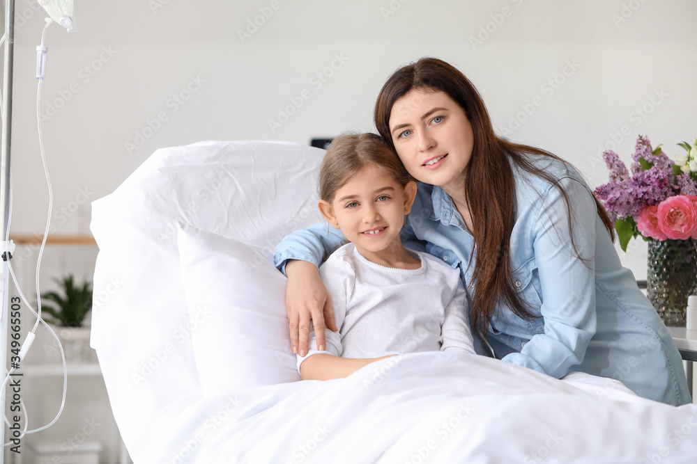 Fototapeta premium Mother visiting her little daughter in hospital