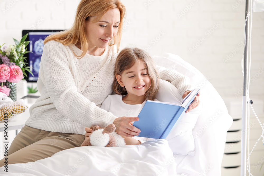 Mother visiting her little daughter in hospital Mother visiting her little daughter in hospital