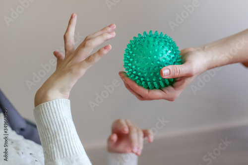 hands of a child with cerebral palsy