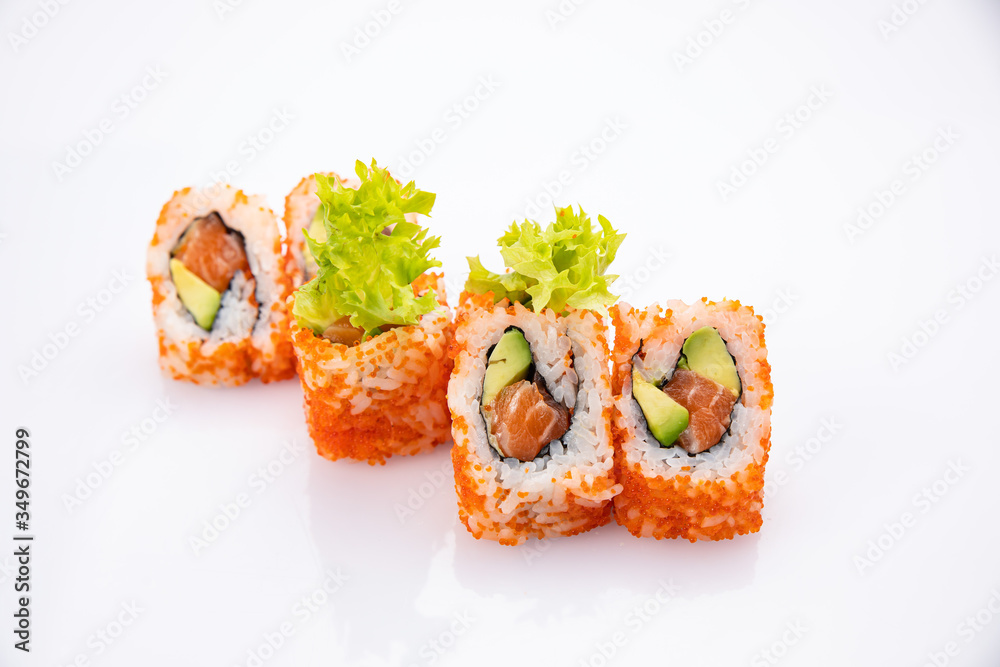 Japanese cuisine. Sushi roll on white background. Japanese cuisine. Sushi roll on white background.