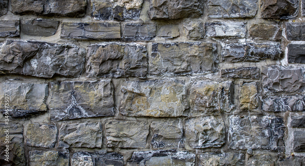 texture of old stone wall - rock bricks background texture of old stone wall - rock bricks background
