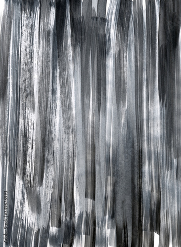 Watercolor background with vertical strokes of paint. Dark monochrome background. Abstract artwork with black watercolor lines. Hand-drawn background in black paint.