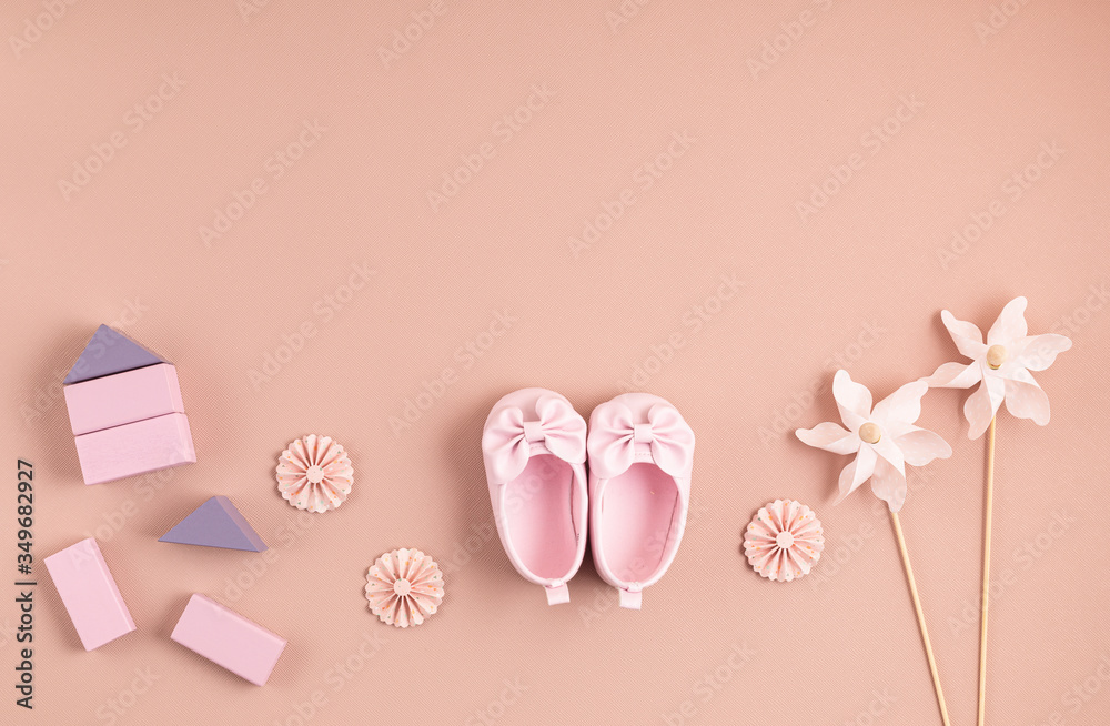 Cute newborn baby girl shoes with festive decoration over pink background.  Baby shower, birthday, invitation or greeting card idea Stock Photo | Adobe  Stock