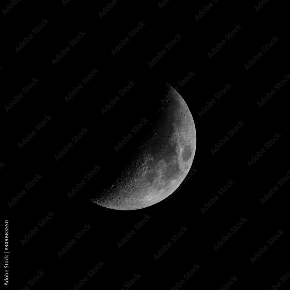 Waxing crescent moon phase with black background Waxing crescent moon phase with black background