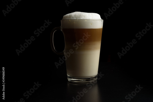 cup of latte coffeeon a glass mug