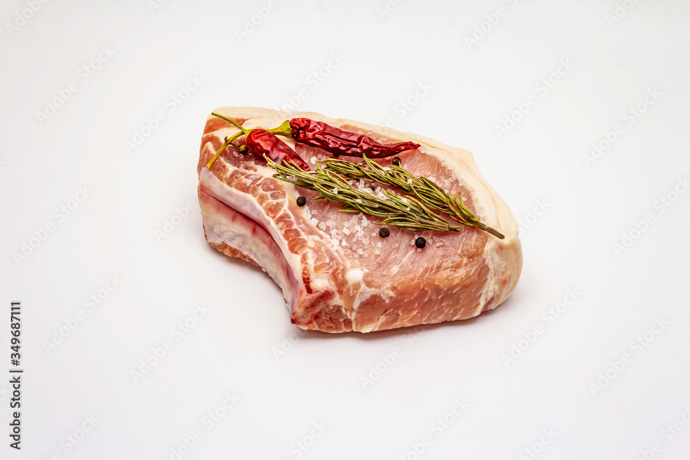 Raw pork steak isolated on white background