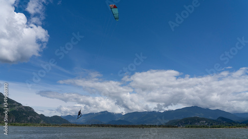 Kiteboarding in Squamish, BC, Canada in cold spring ocean water with gusty winds