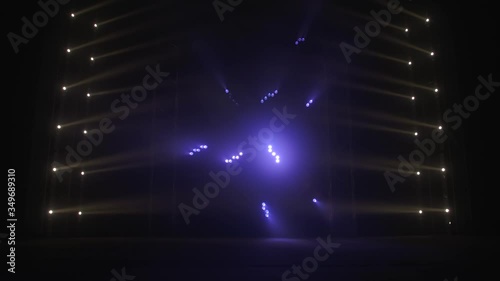 Stage with spot lighting, shining empty scene for holiday show, award Ceremony or advertising on the dark blue and gold Background. photo