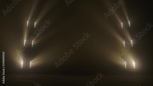 Stage with spot lighting, shining empty scene for holiday show, award Ceremony or advertising on the gold spotlight Background. photo