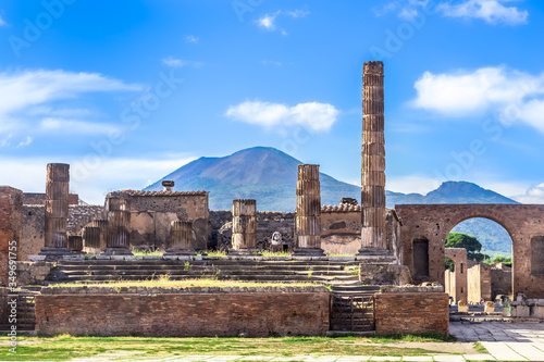 Fototapeta Naklejka Na Ścianę i Meble -  Pompeii in Italy, ruins of the antique Temple of Apollo with bronze Apollo statue, Naples.