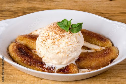 Banana Flambe With Vanilla Ice Cream. close up
