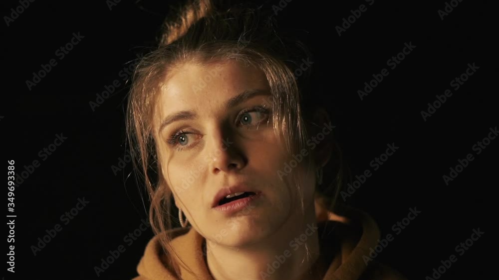 Girl showing different emotions on black background Girl showing different emotions on black background