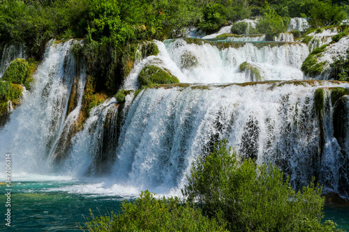 Fototapeta Naklejka Na Ścianę i Meble -  Waterfall in Krka National Park in Croatia - Flowing fresh water in the Dalmatian mountains