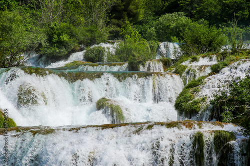 Waterfall in Krka National Park in Croatia - Flowing fresh water in the Dalmatian mountains
