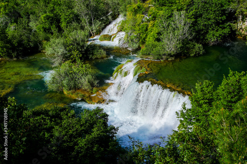 Fototapeta Naklejka Na Ścianę i Meble -  Waterfall in Krka National Park in Croatia - Flowing fresh water in the Dalmatian mountains