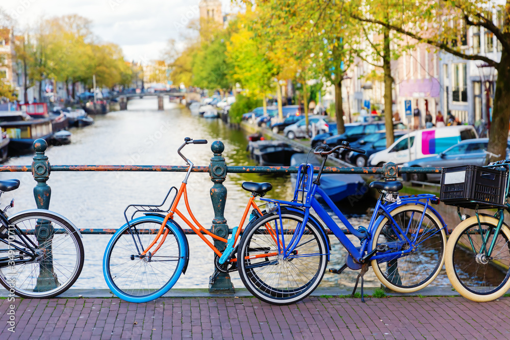 colorful bicycle on a canal bridge in Amsterdam