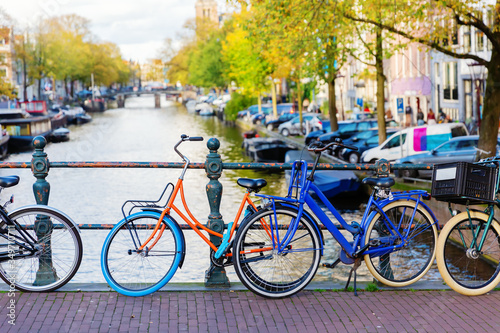 colorful bicycle on a canal bridge in Amsterdam