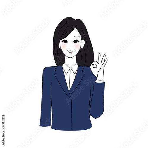 指で丸をつくる制服を着た女性