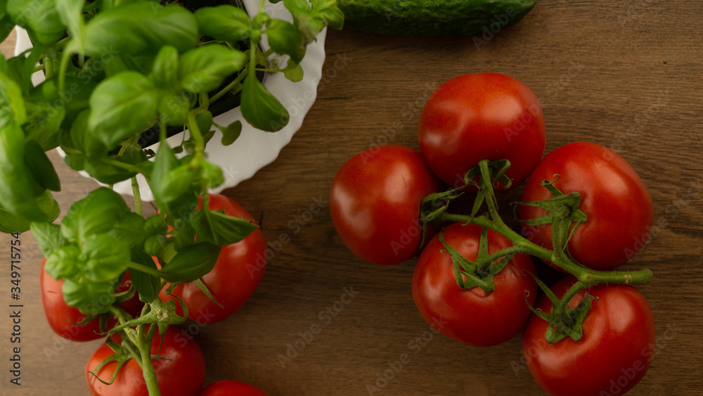Vegetables. Tomatoes and cucumbers with basil. Ready free entry space
Vegetables. Tomatoes and cucumbers with basil. Ready free entry space