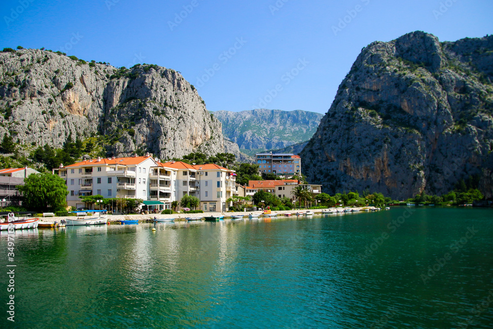 Canyon at the mouth of the Cetina river in Omis, Croatia - Residential area by the Adriatic Sea on the Makarska riviera