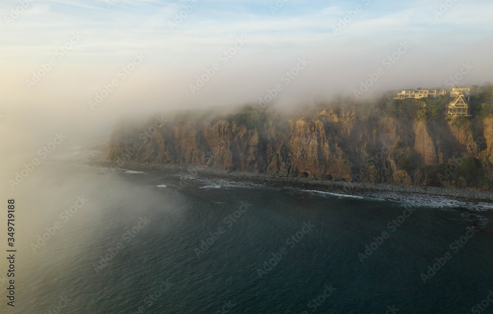 Dana Point cliffs being blanket by fog at sunset