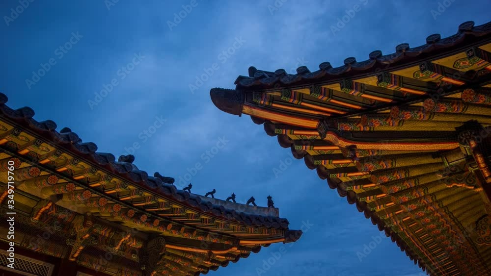 timelapse of night view with building and roof in gyeongbokgung palace (royal palace) 