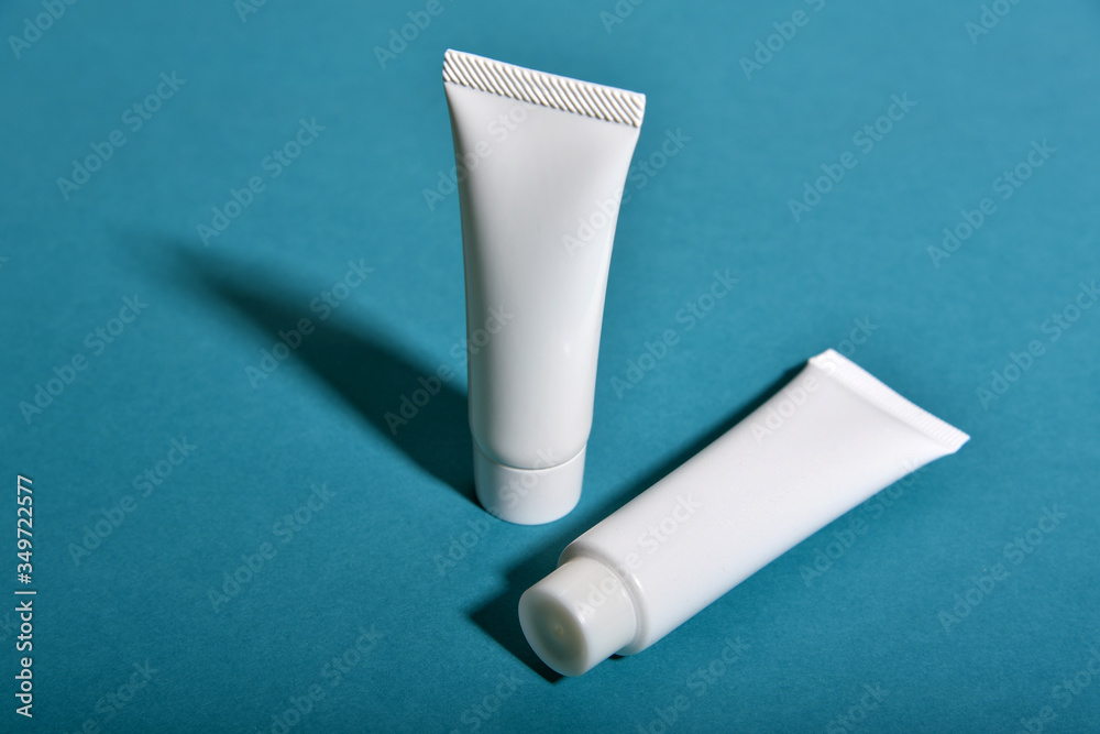 Cosmetic bottle containers packaging with shadow and light effect, Blank label for organic branding mock-up, Natural skincare beauty product concept. Cosmetic bottle containers packaging with shadow and light effect, Blank label for organic branding mock-up, Natural skincare beauty product concept.