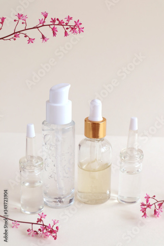 Cosmetic products for face and body in containers without labels. The concept of Spa skin care and body.