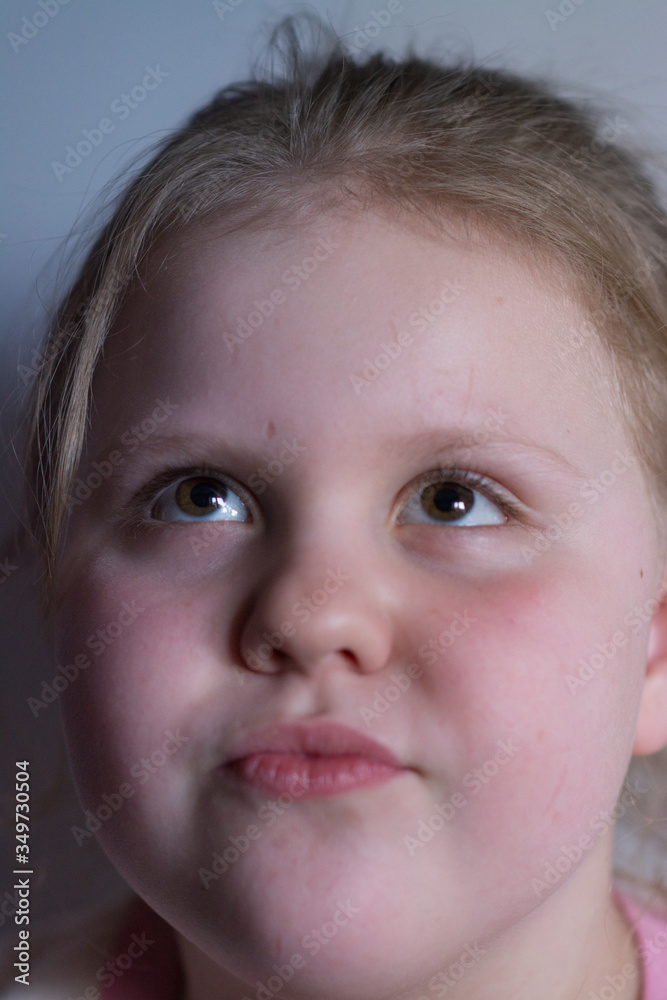 The girl expresses displeasure on her baby face
The girl expresses displeasure on her baby face